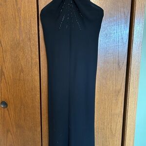 Stylish Black Halter style dress with bead details.